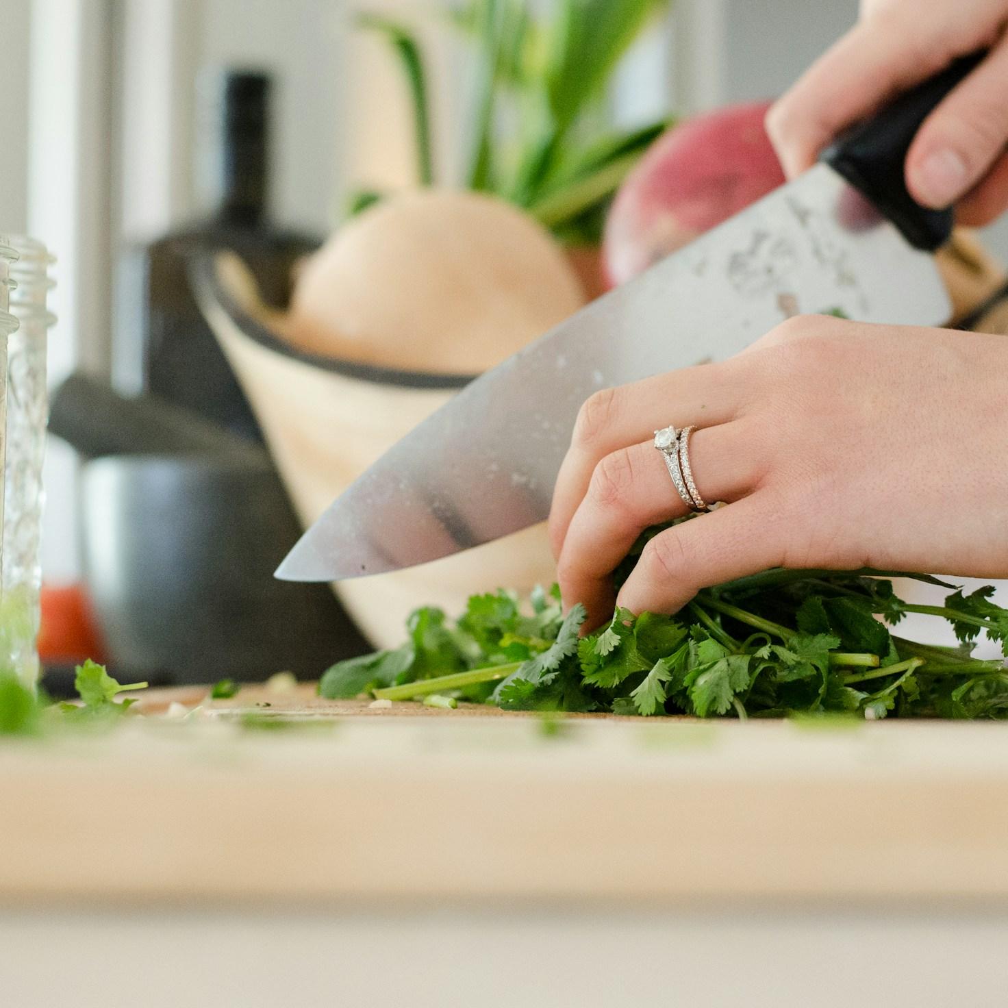 Members collaborating in a modern kitchen, sharing recipes and techniques